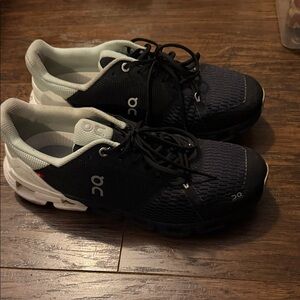 On Running Black and White Athletic Shoes